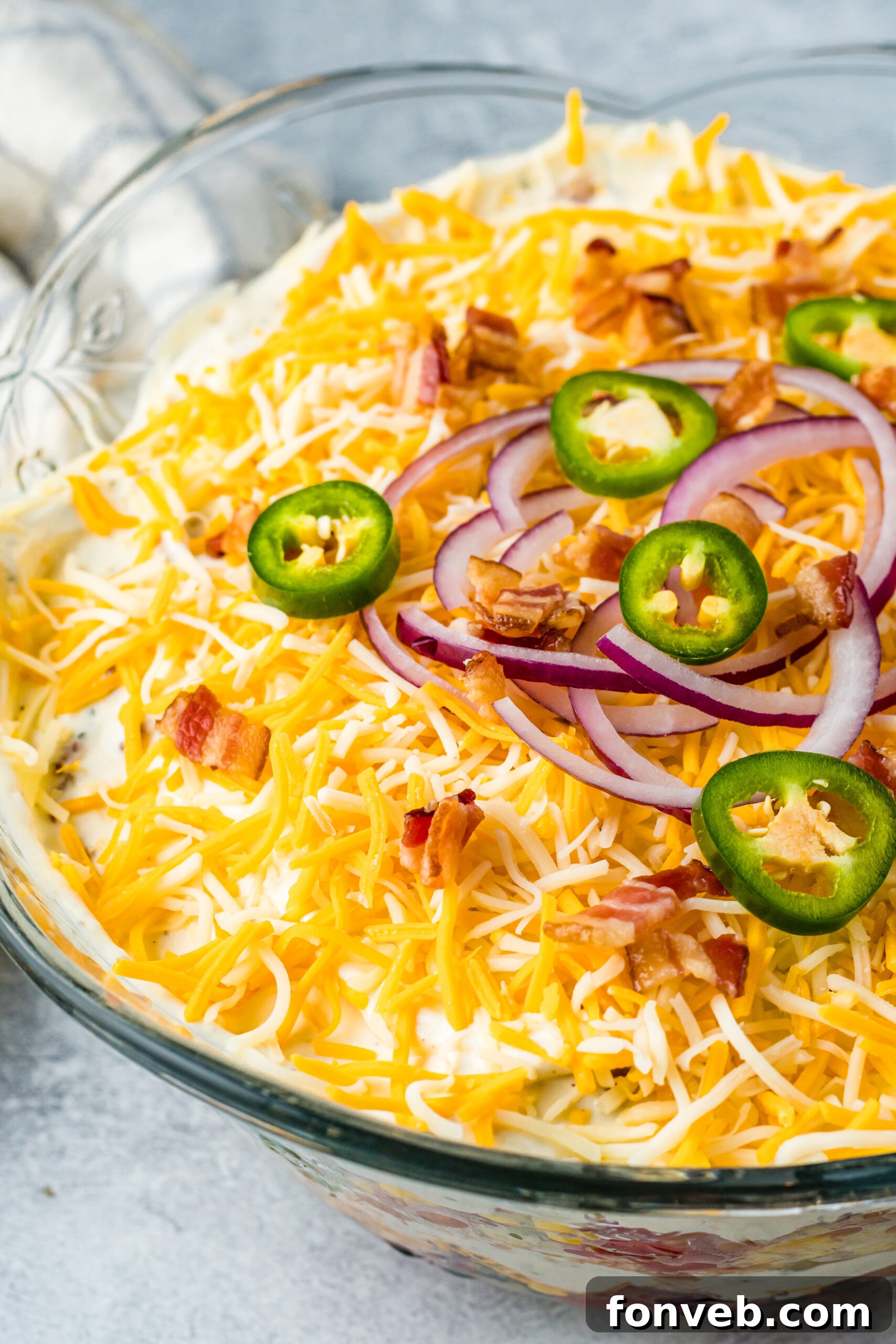 Southern Cornbread Delight 3 Close up view of Cornbread Salad in a glass bowl.