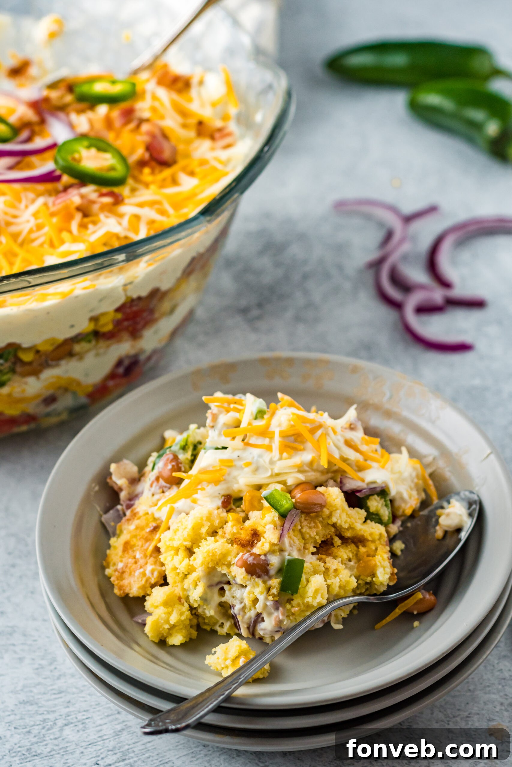 Southern Cornbread Delight 5 Front view of a serving of Cornbread Salad in a gray bowl.