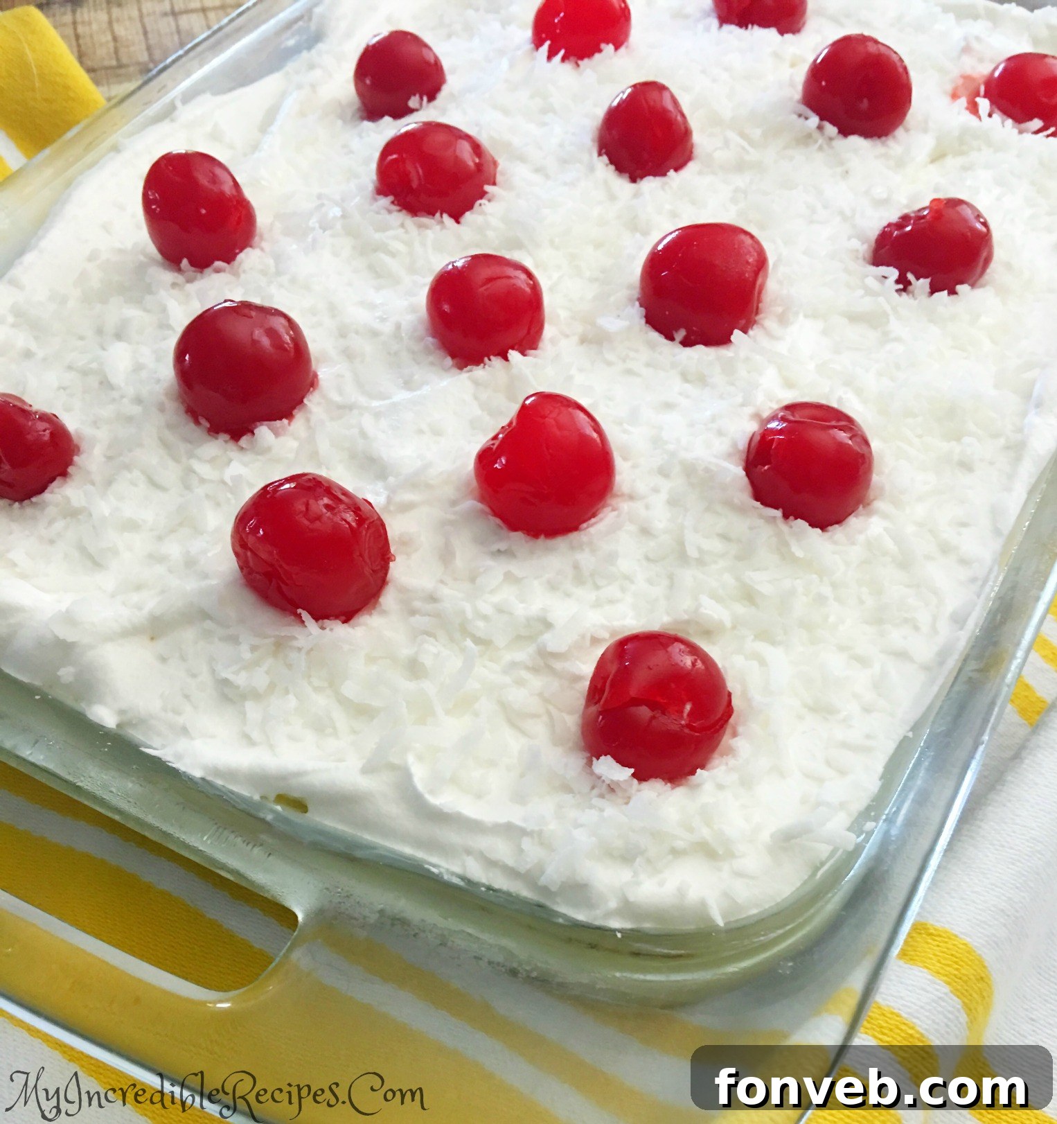 Toasted coconut flakes sprinkled over the cake