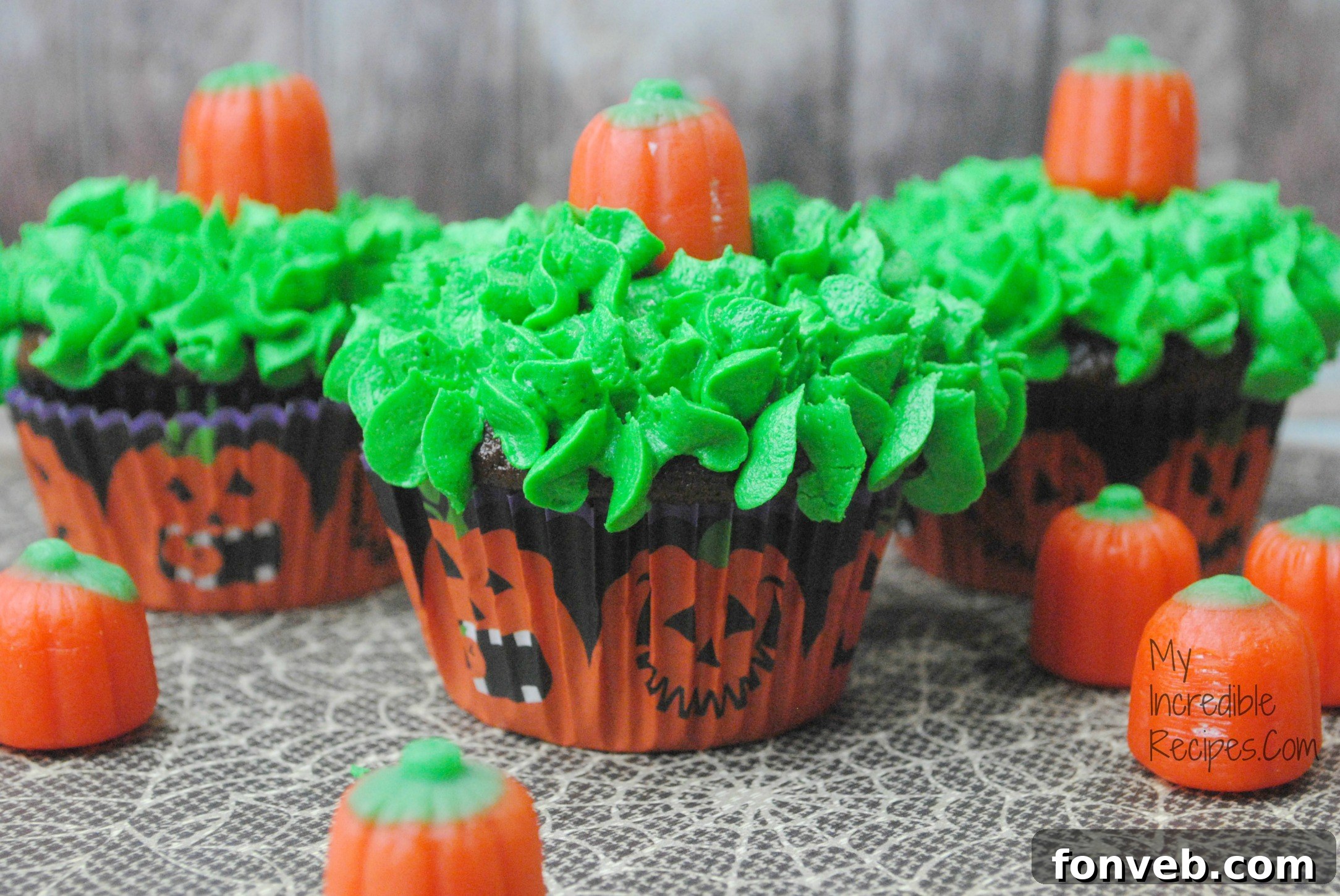 Autumn Pumpkin Patch Cupcakes 2 Autumn-themed cupcakes with pumpkin decorations, perfect for Fall baking