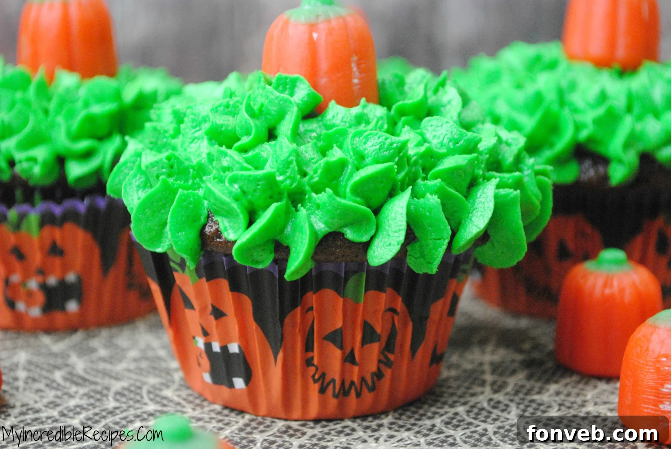 Autumn Pumpkin Patch Cupcakes 5 Close-up of a festive pumpkin patch cupcake ready for a party