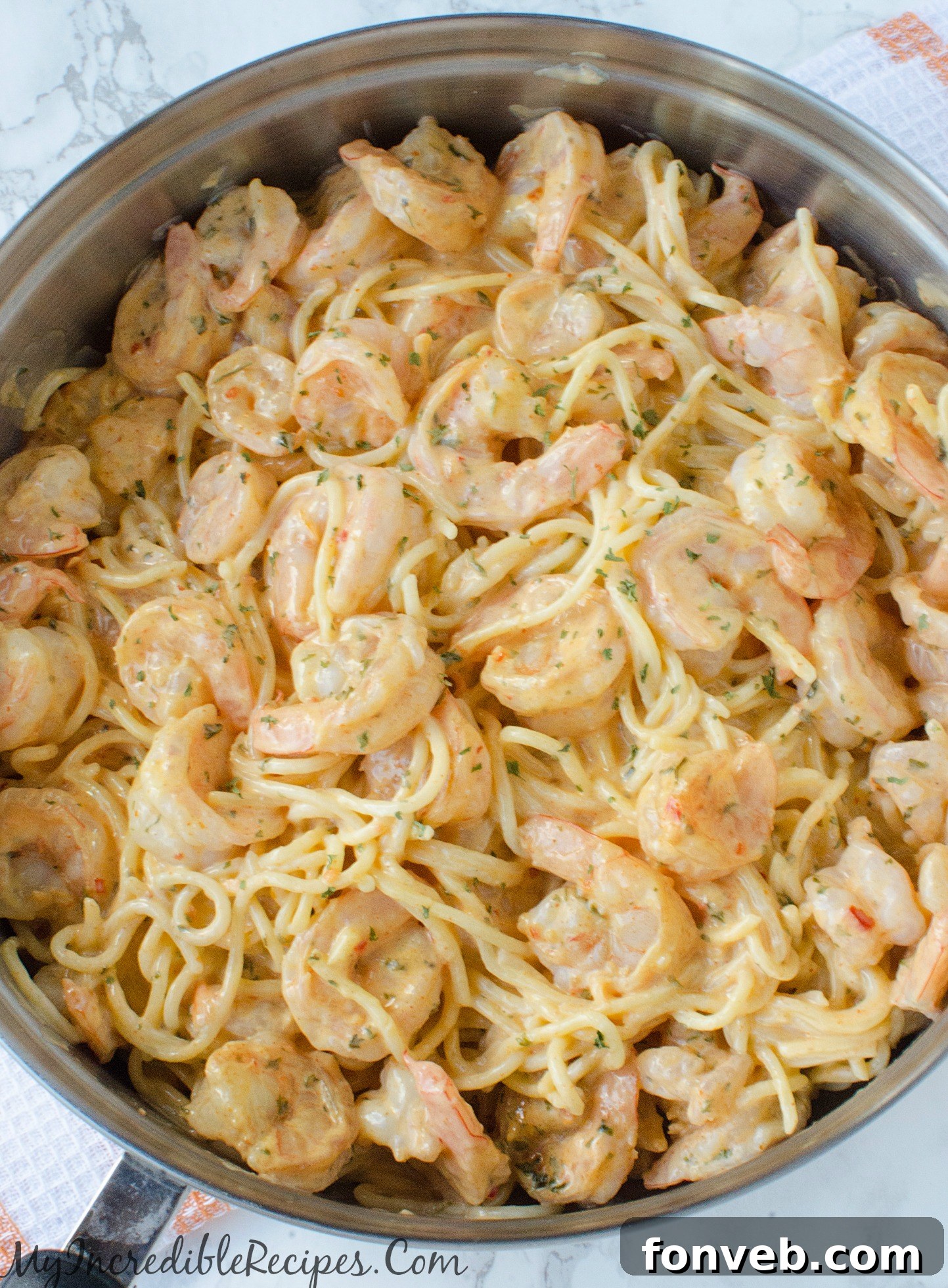 Close-up of the delicious creamy sauce coating the pasta.