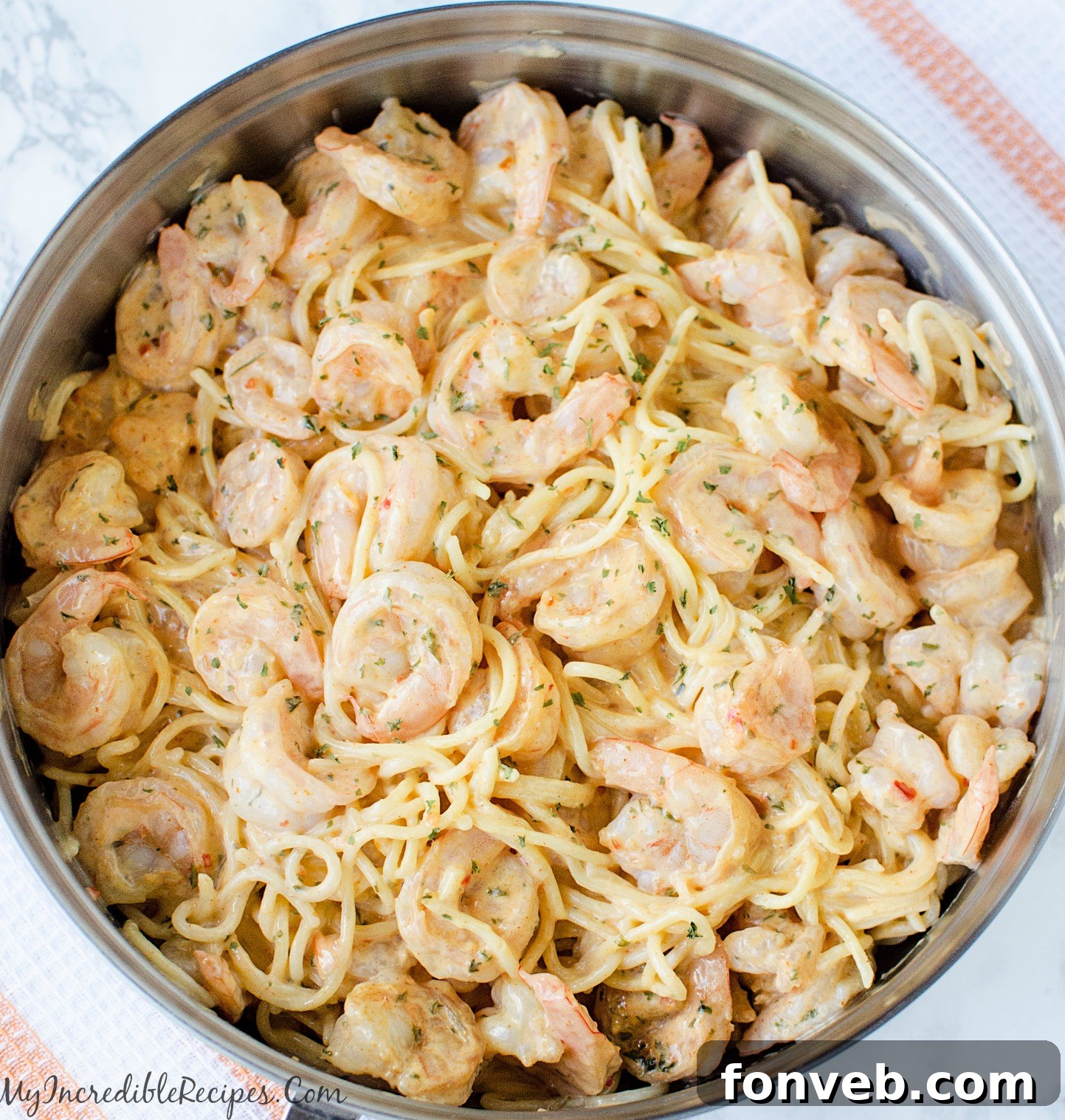 Ingredients for Bang Bang Sauce laid out, including mayonnaise, chili sauce, and lime.