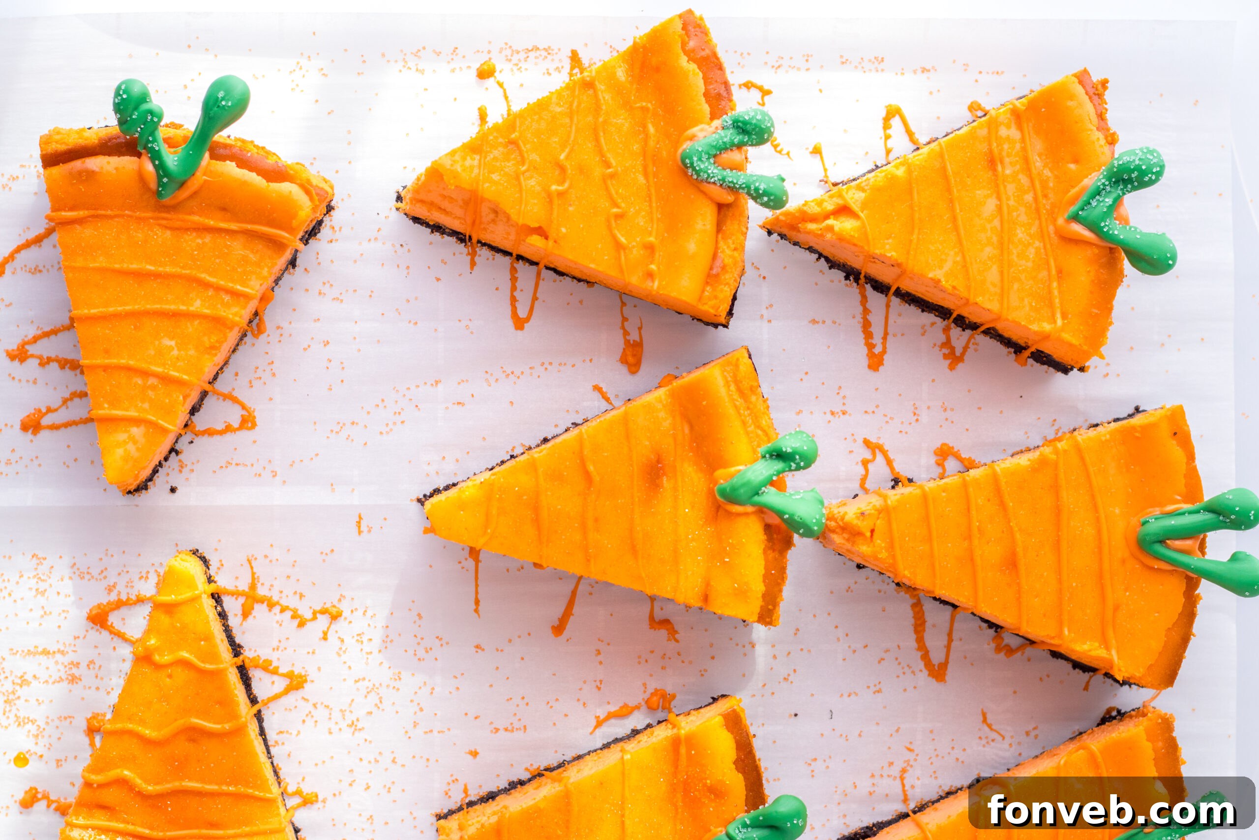 Orange and green candy melts in separate bowls, ready for melting and decoration.