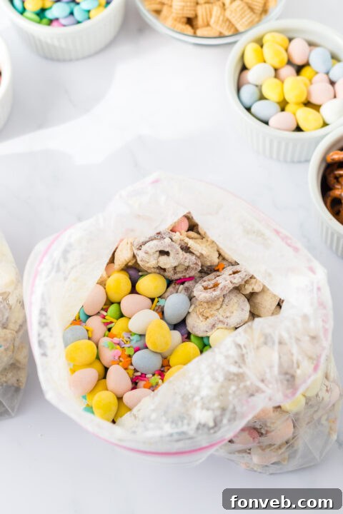 Powdered sugar and funfetti cake mix being added to the bag.
