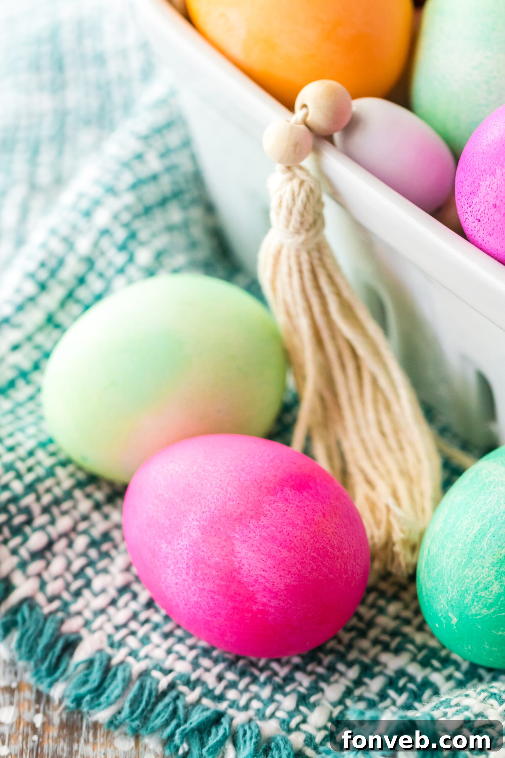 Close up view of a pink slower cooker dyed Easter egg. 