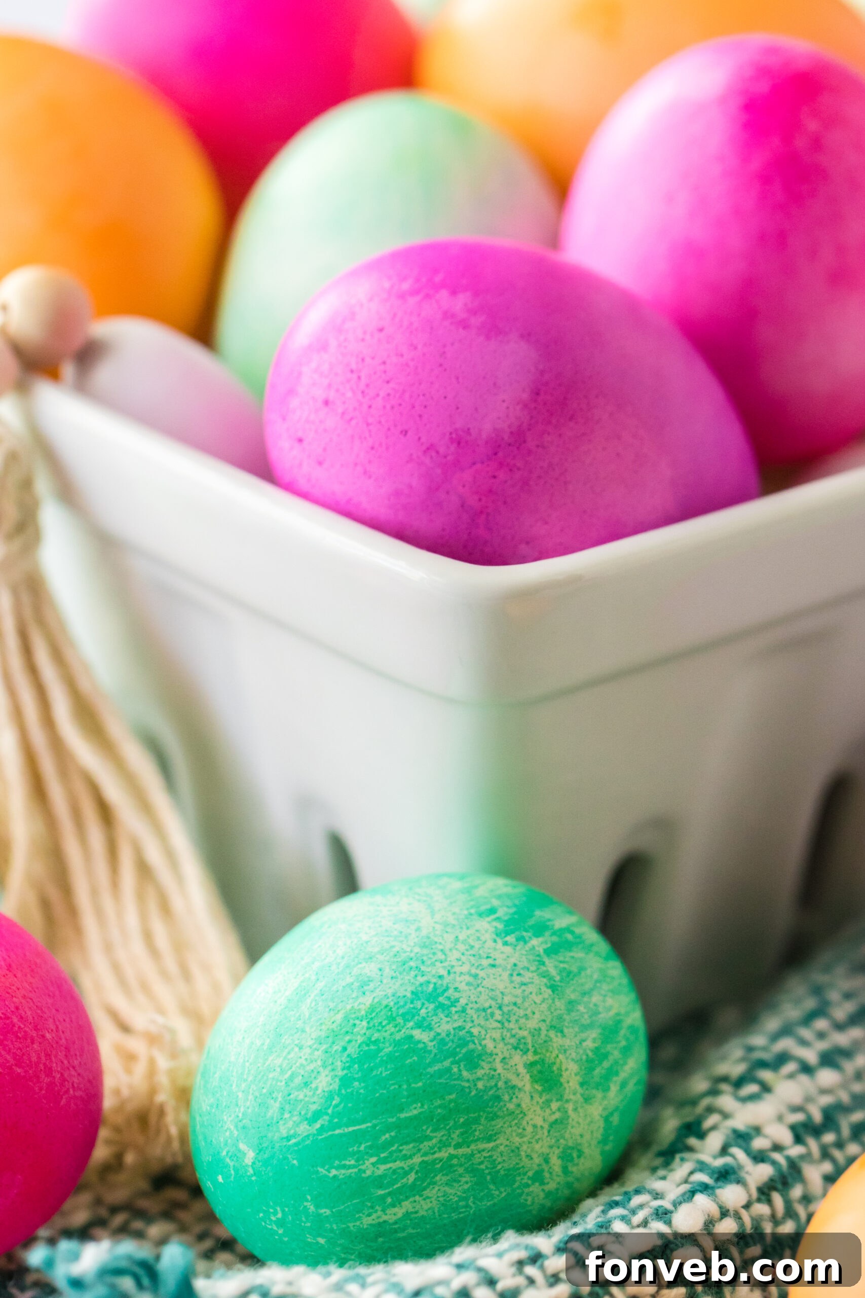 Close up view of a teal slower cooker dyed Easter egg. 