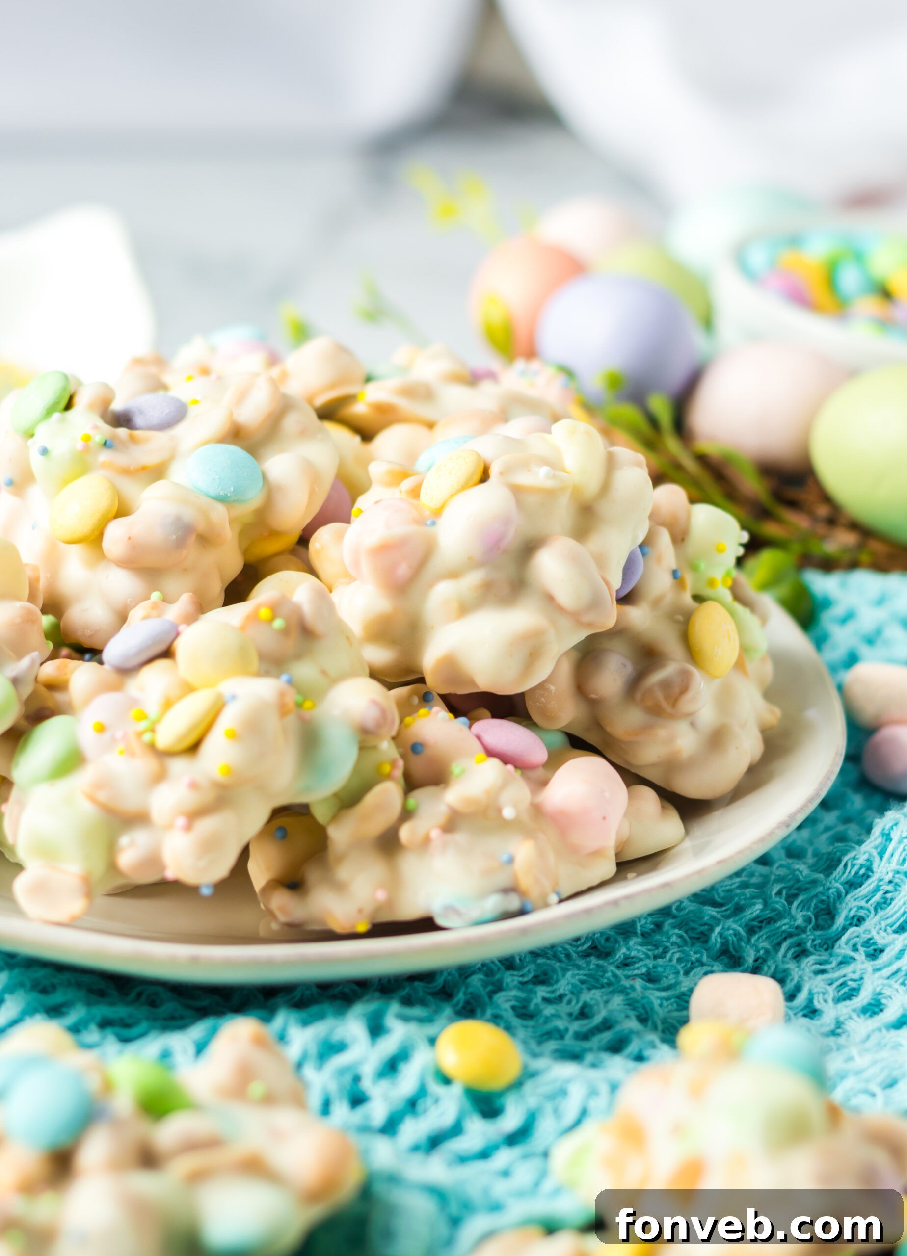 Side view of the stacked candy on a white plate.