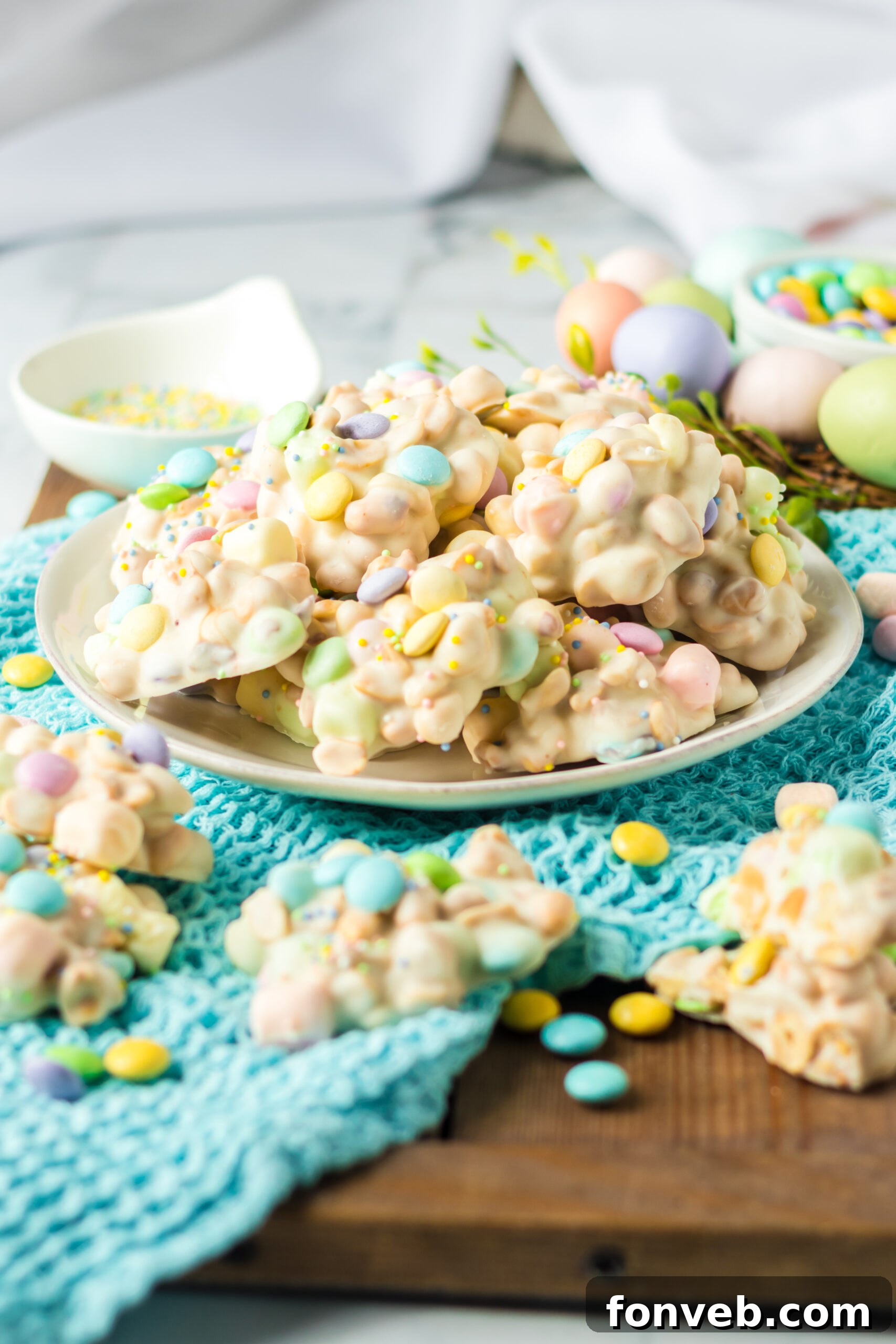 Side view of the stacked candy on a white plate.