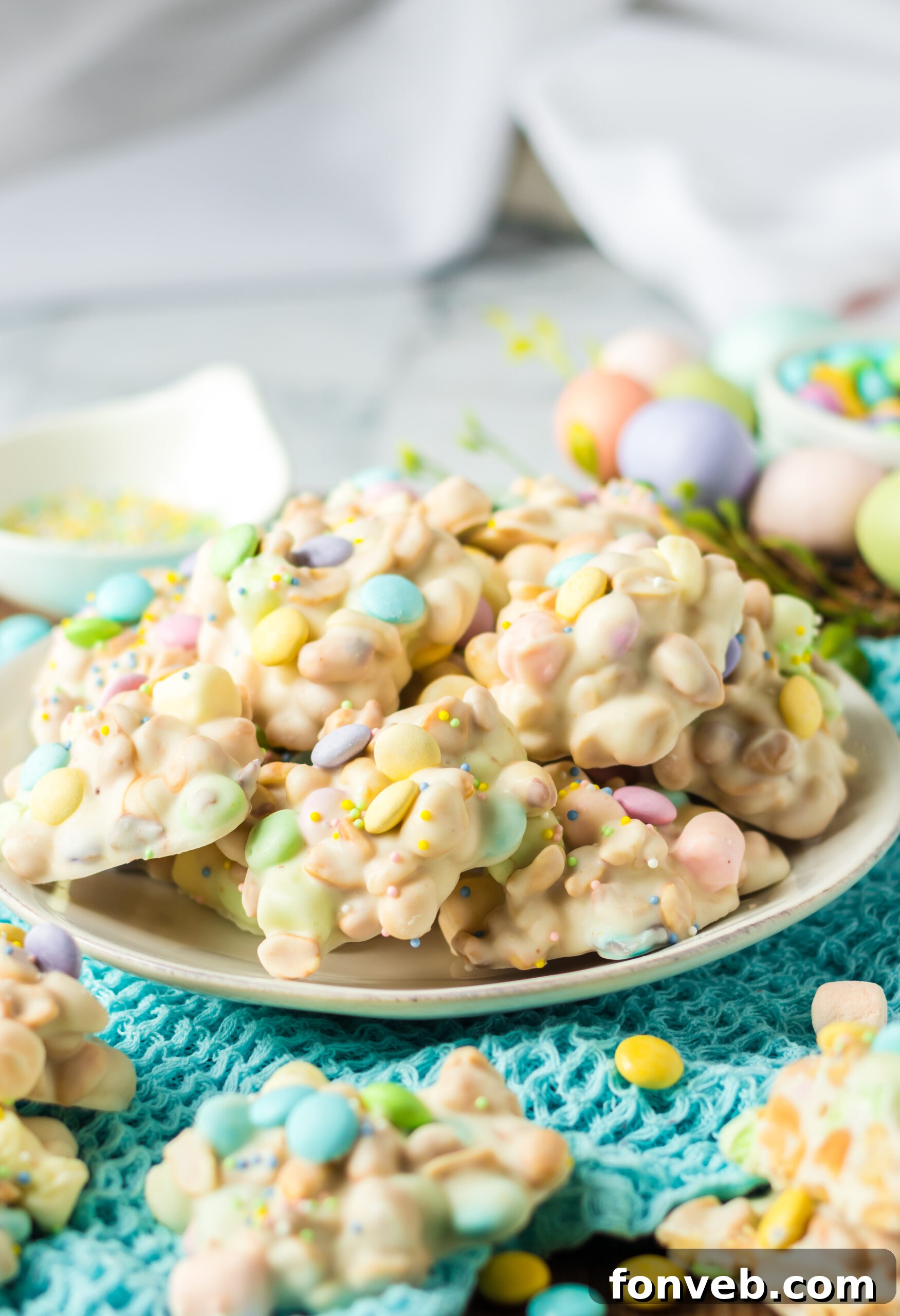 Side view of the stacked candy on a white plate.