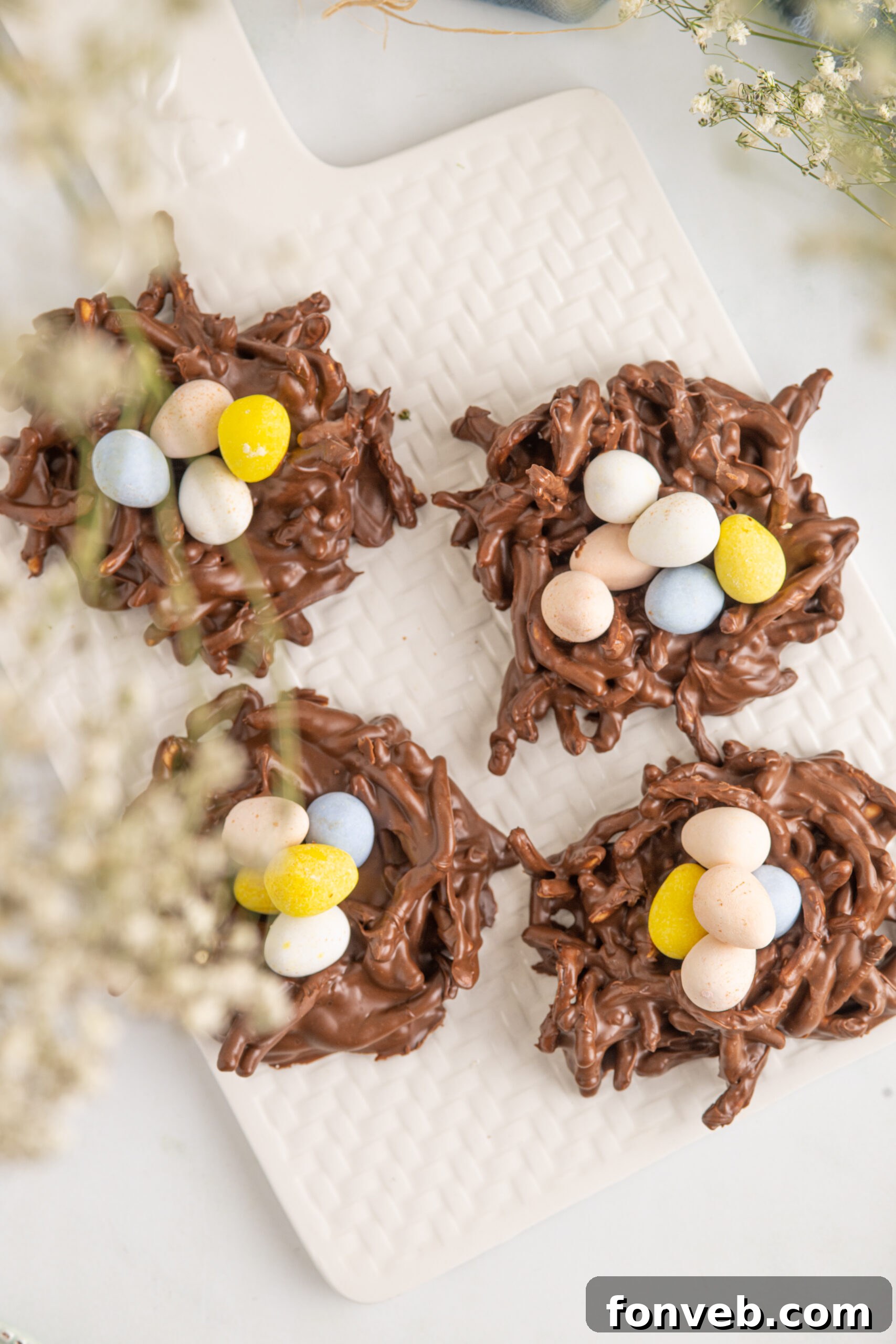 Whimsical Bird Nests 12 Overhead shot of Birds Nest Cookies on a white serving tray.