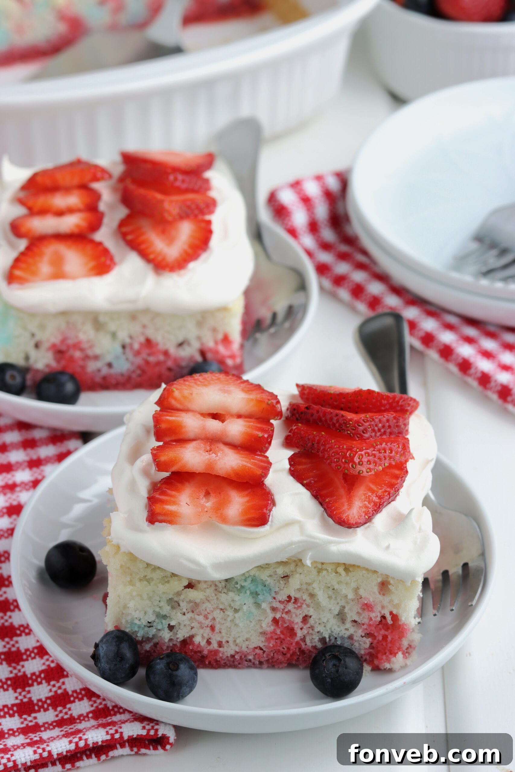 A final close-up of a slice of the American Flag Cake with vibrant colors.