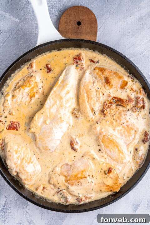 Dreamy Date Night Chicken 10 Heavy cream being poured