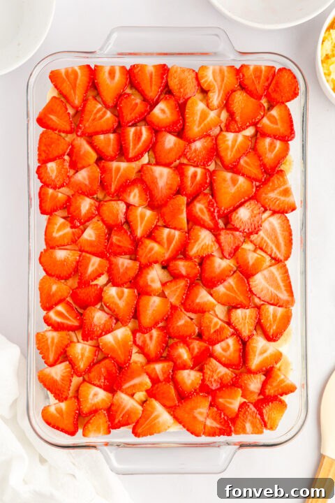 Fluffy whipped cream or Cool Whip, essential for the final topping.