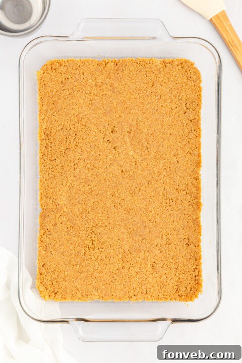 A vibrant close-up of fresh banana slices, ready to be layered into the no-bake cake.