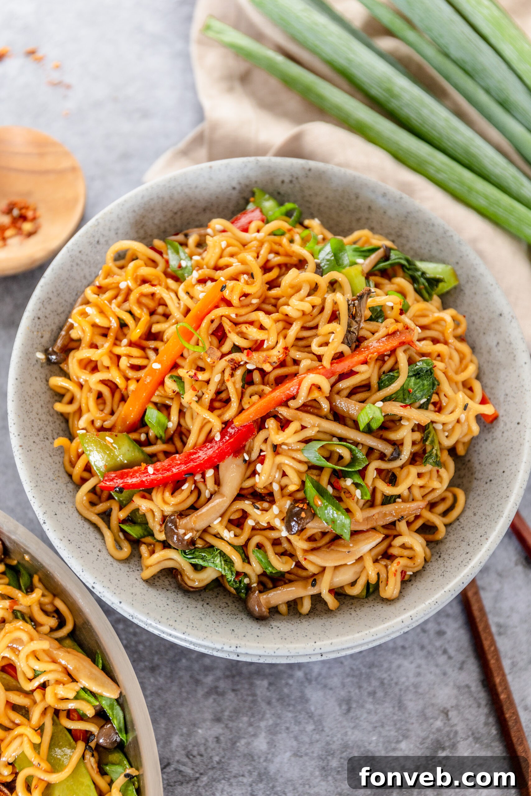 Ramen Stir Fry in a speckled white bowl. 