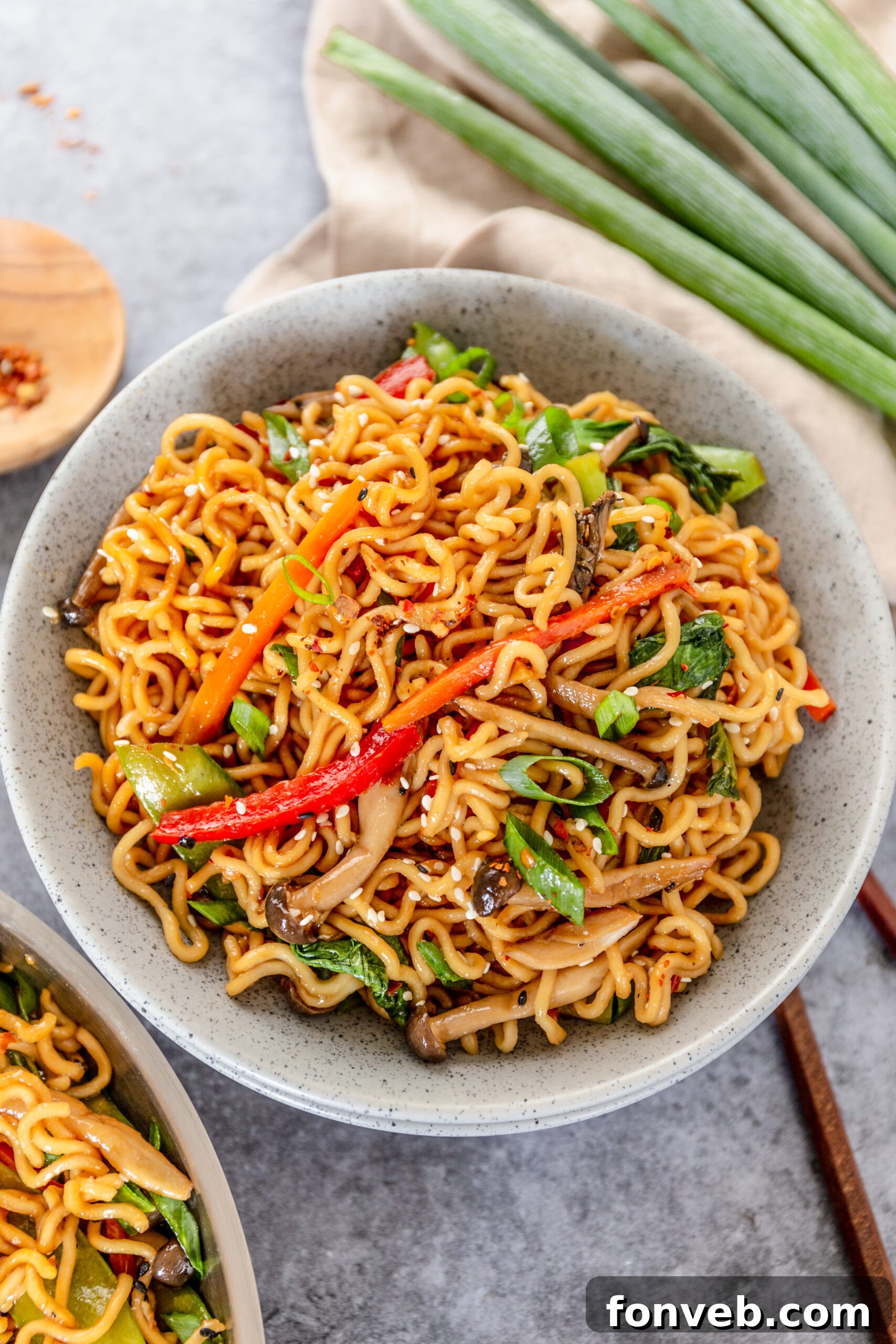 Ramen Stir Fry in a speckled white bowl. 