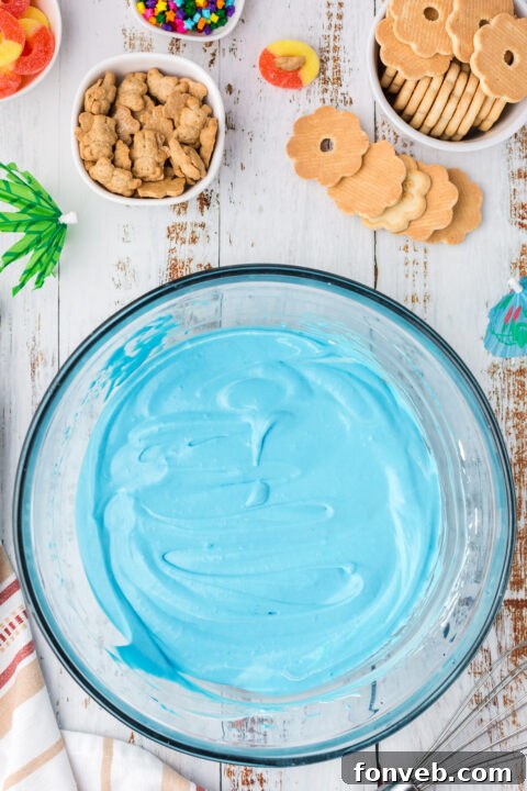 Image showing the crushed cookie 'sand' layer at the bottom of a cup.