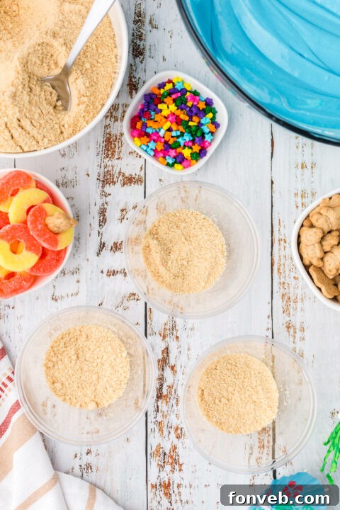 Image of a single Beach Cheesecake Pudding Cup with full decoration.