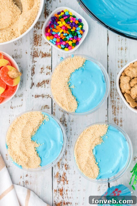 Image showcasing the layered structure of the pudding cups before chilling.