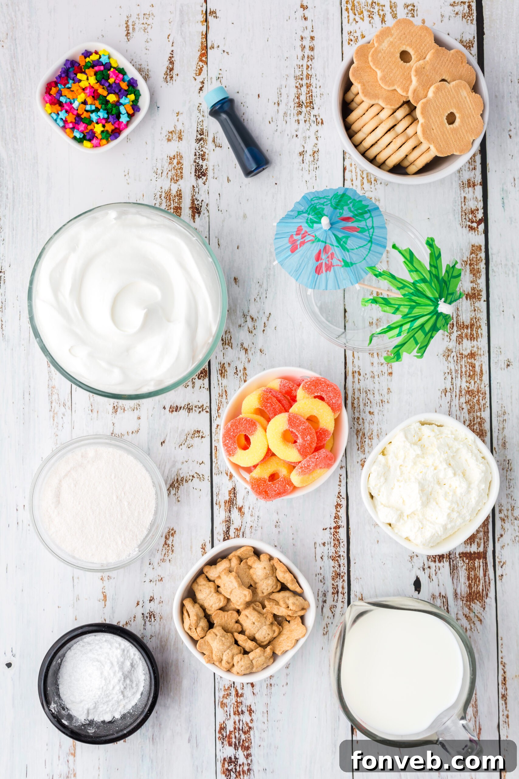 Overhead view of all the fresh ingredients laid out for making Beach Cheesecake Pudding Cups.