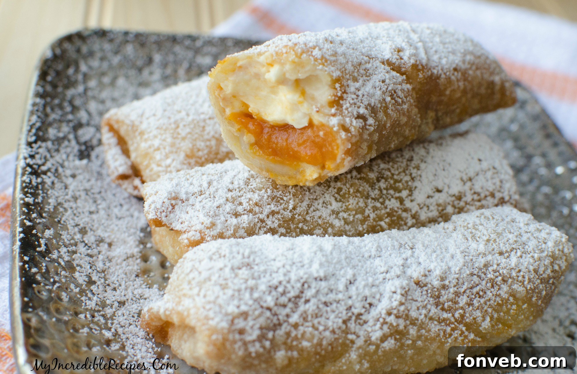 Crispy Pumpkin Cheesecake Rolls 7 Pumpkin Cheesecake Taquitos on a Platter