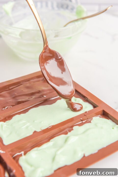 Step-by-step image of chilled Andes Mints being removed from the mold.