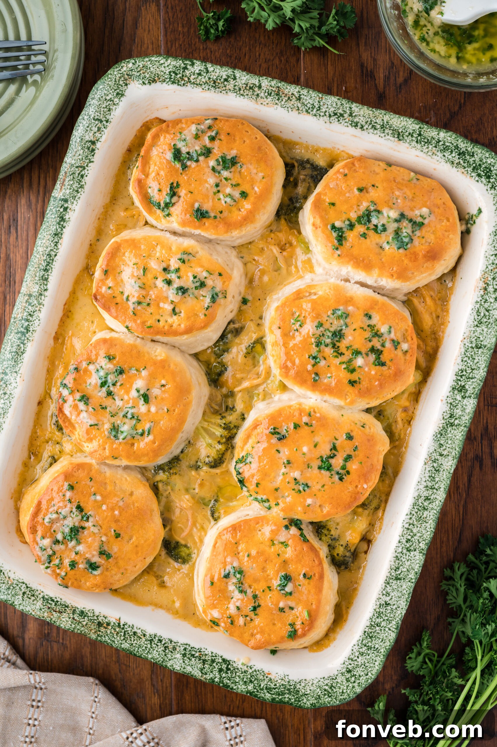 Overhead view of Broccoli Cheddar Biscuit Casserole in a baking dish.