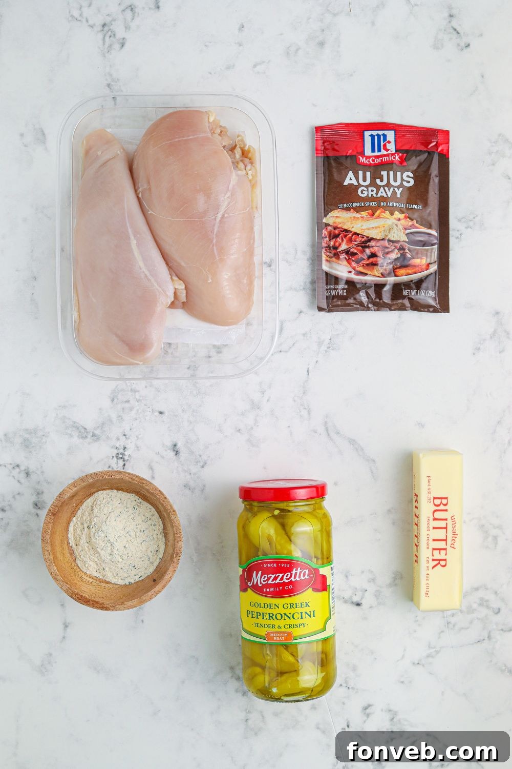 ingredients for mississippi chicken on marble counter