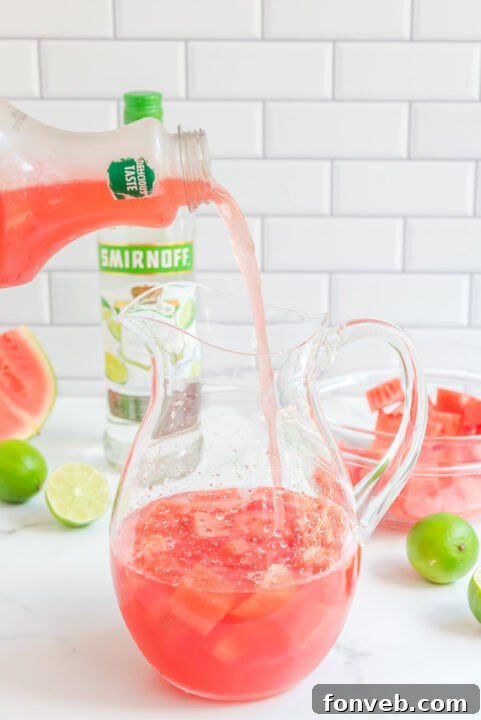 Watermelon slices being added to a cocktail.
