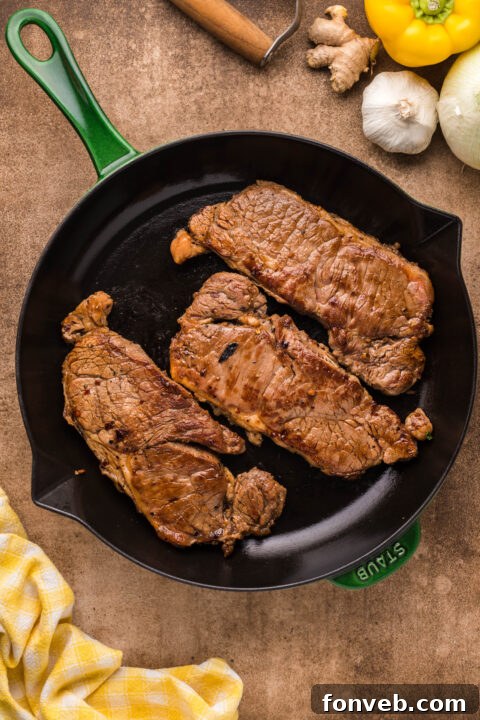 Soy sauce in a measuring cup.