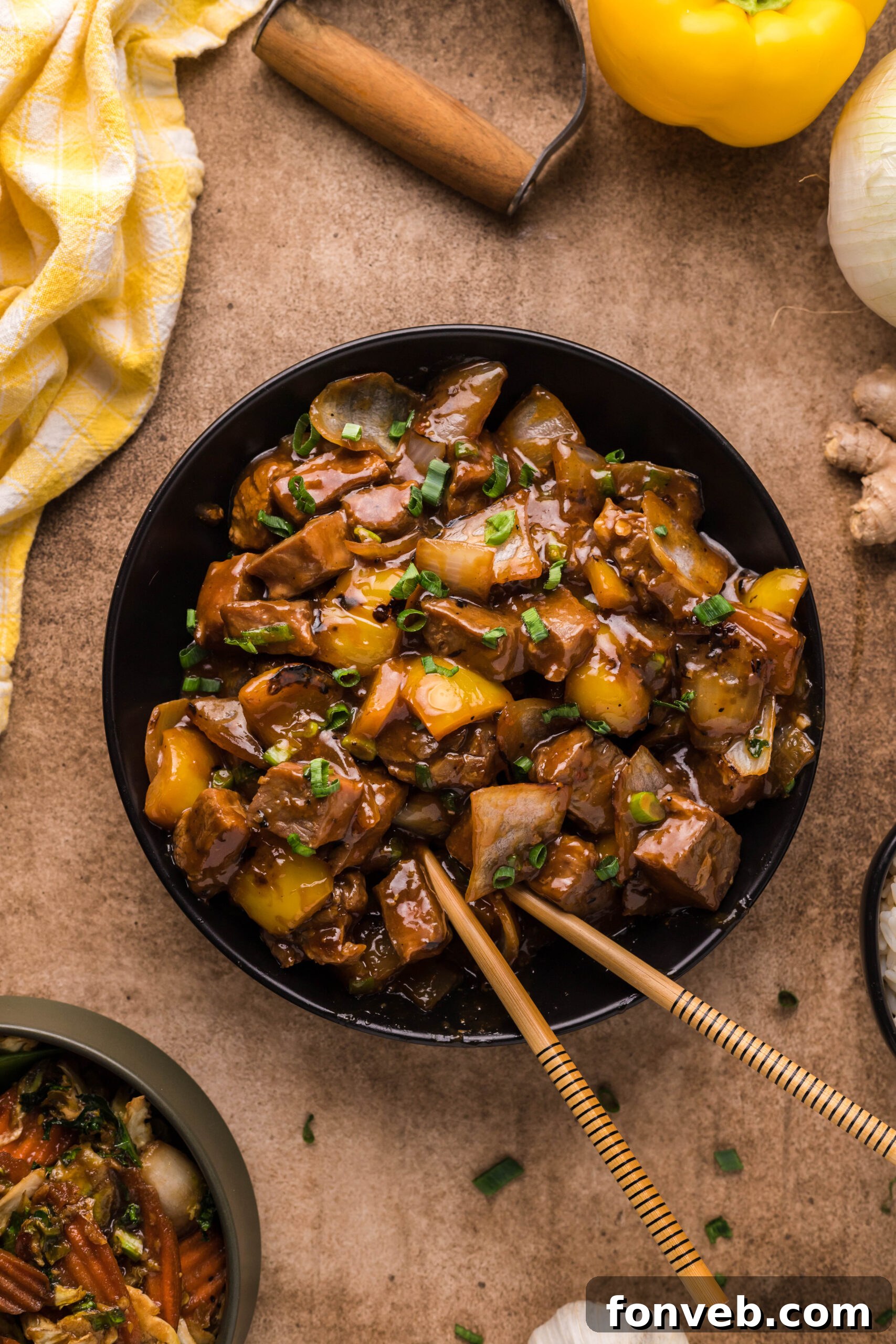 Overhead view of Teriyaki Steak Bites in a black dish.