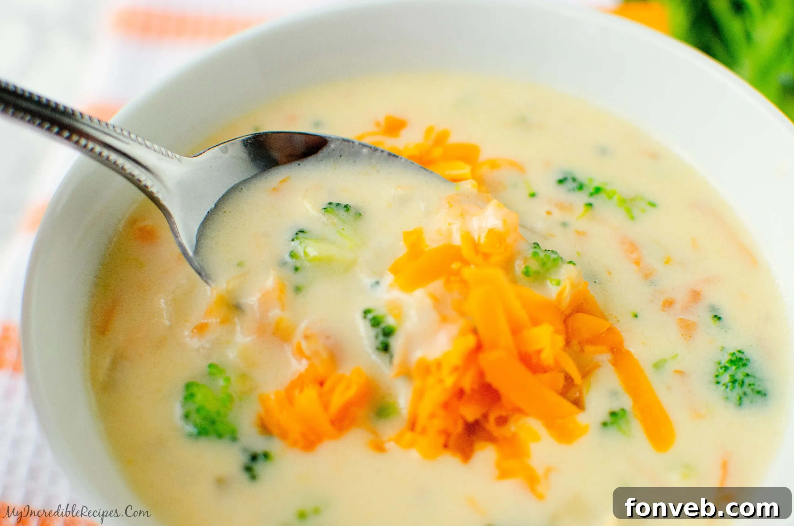A large bowl of homemade broccoli cheddar soup
