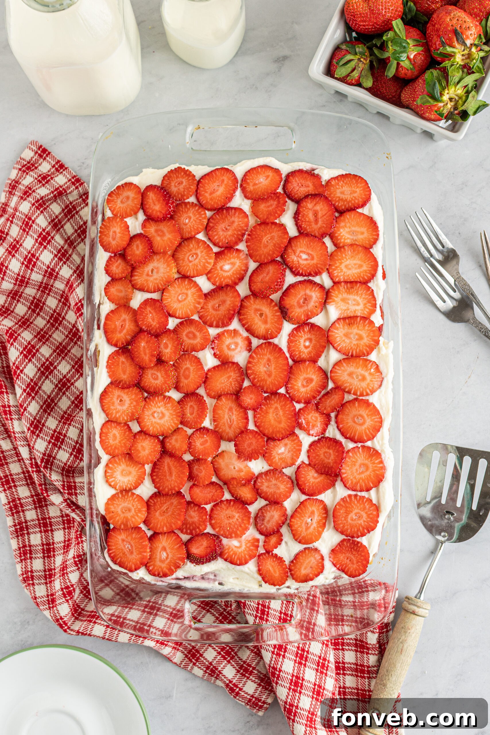 Overhead view of Strawberry Icebox Cake in a clear baking dish. 