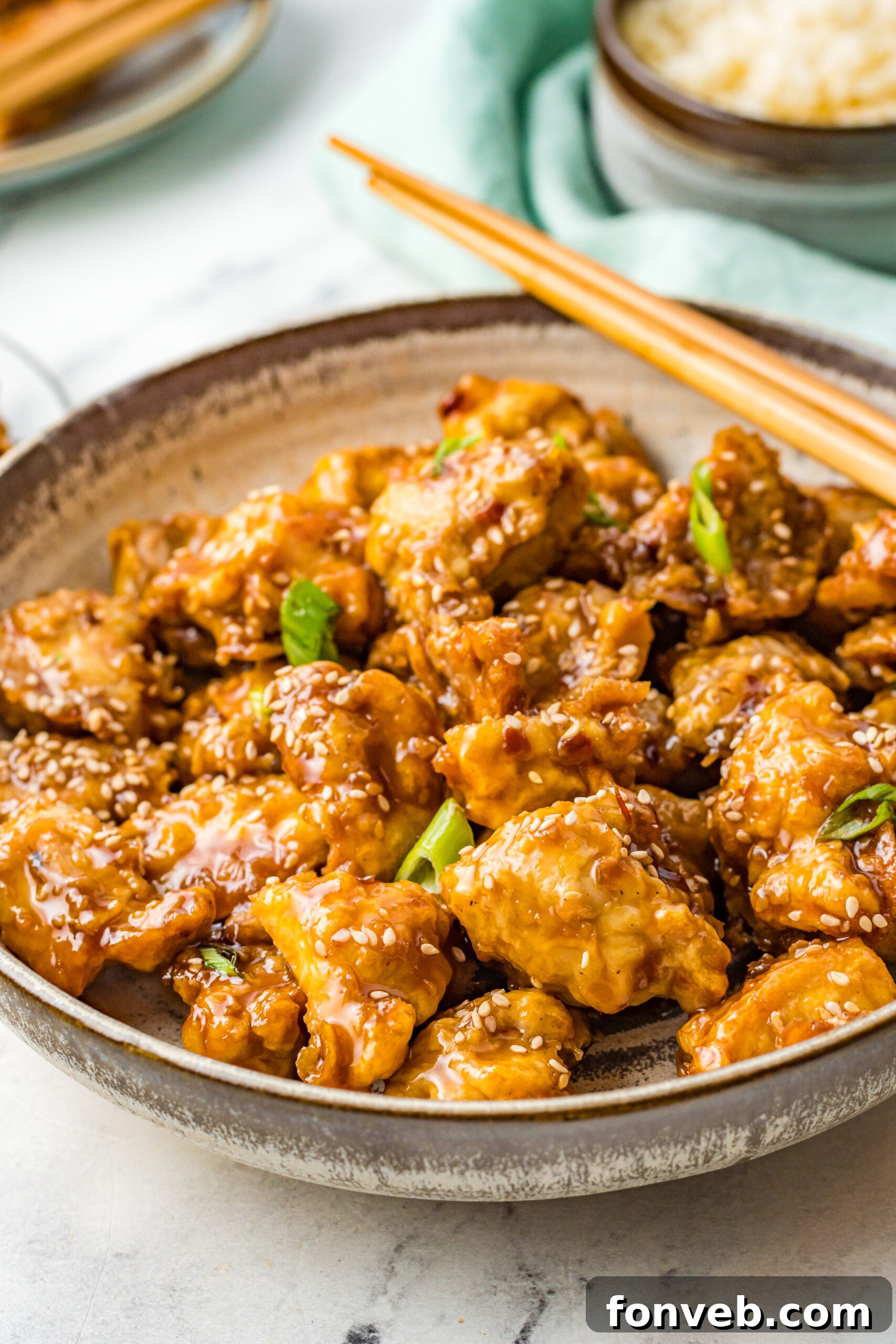 Front view of Air Fryer General Tsos Chicken in a gray dish.