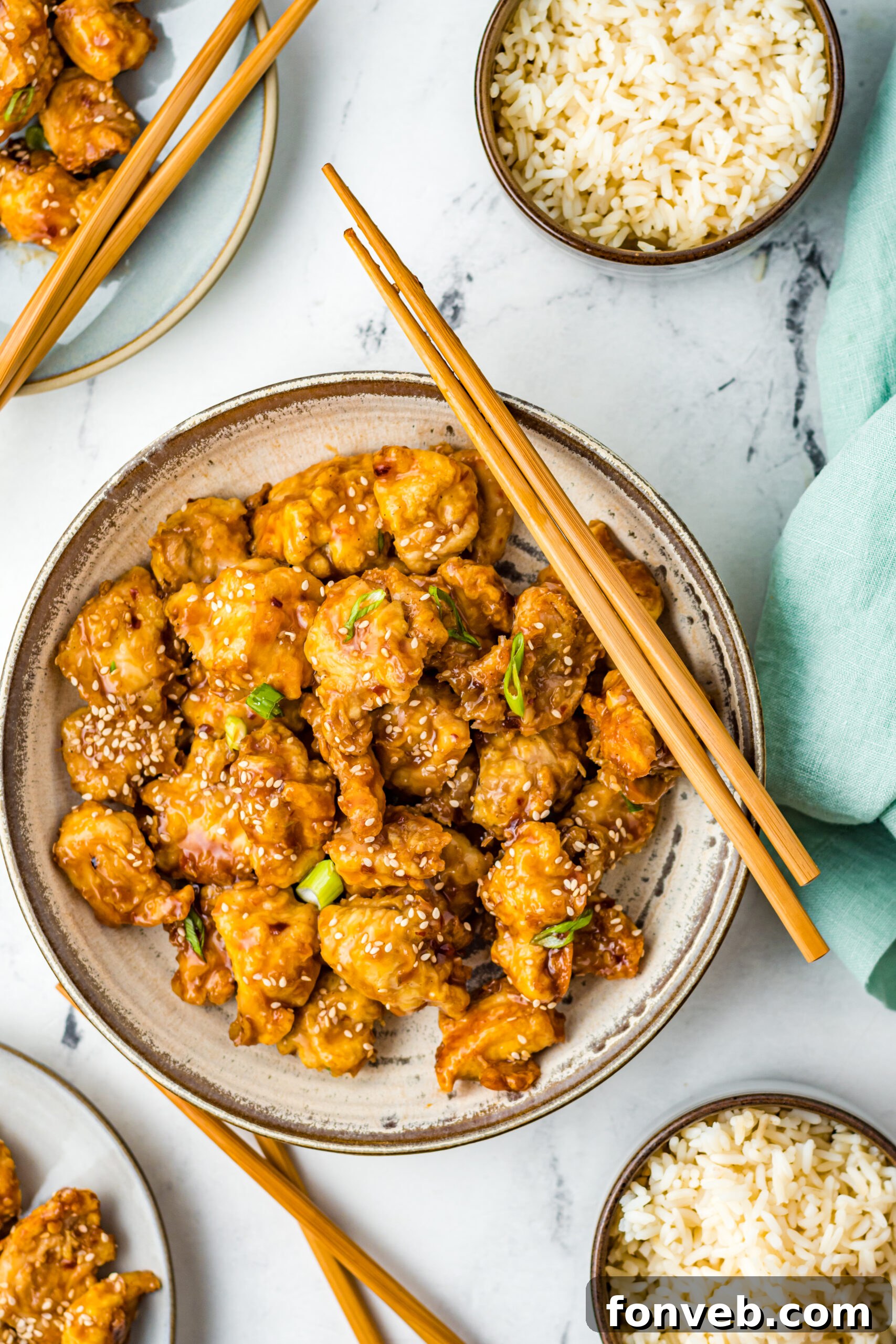 Overhead view of Air Fryer General Tsos Chicken in a gray dish.