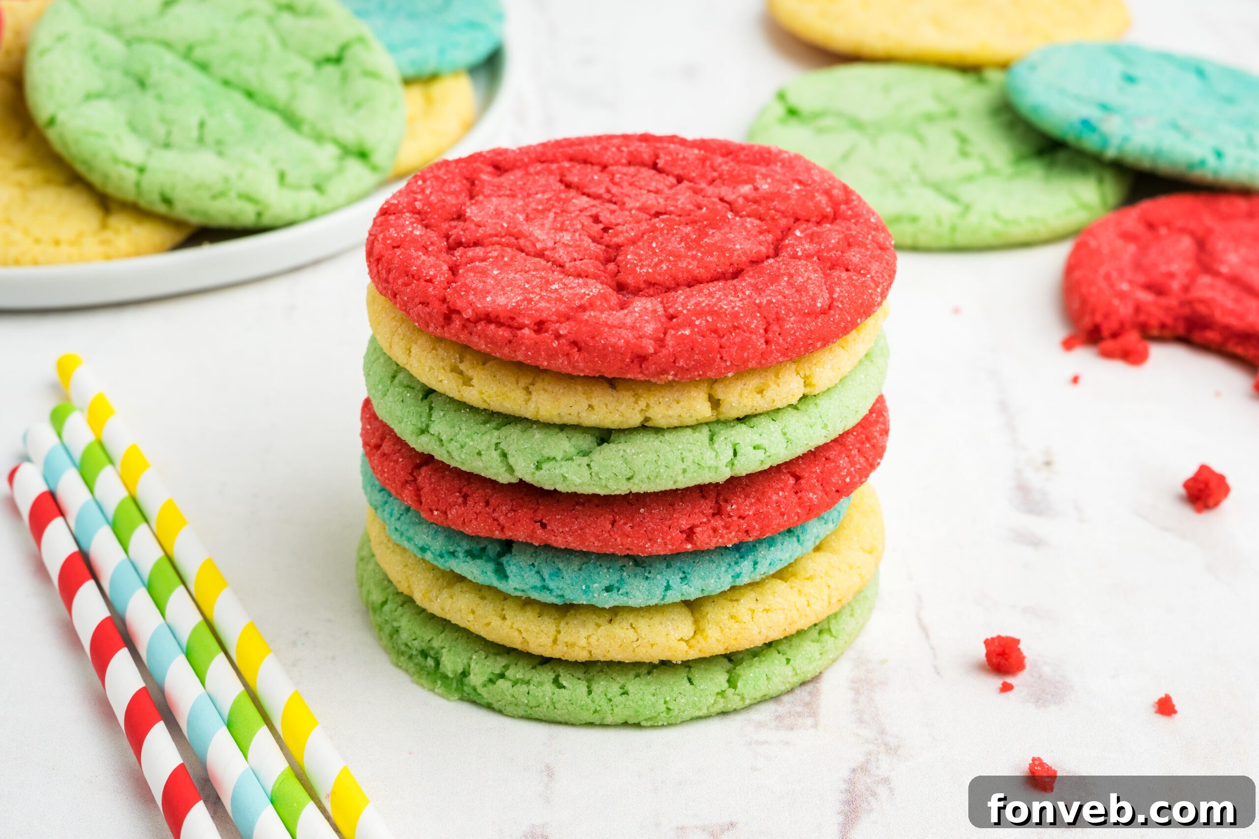 Vibrant Jello Bites 17 Front view of seven vibrant Jello Cookies stacked, showcasing their varied colors and uniform shape.