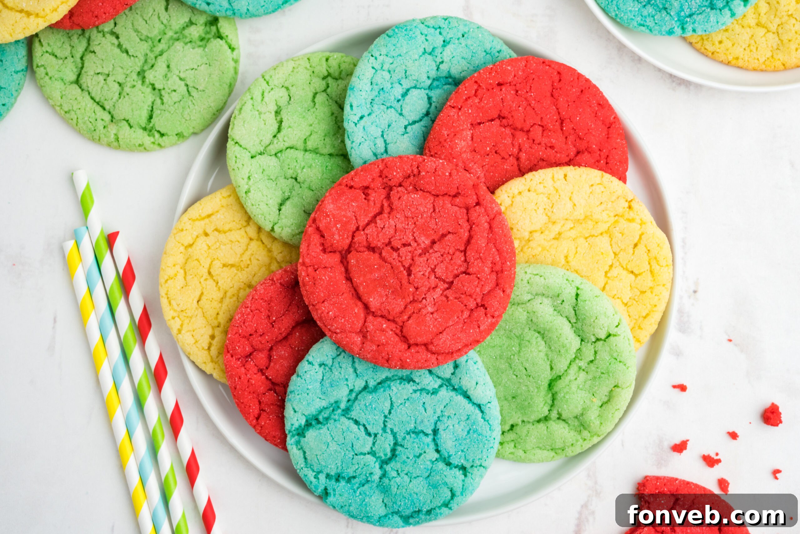 Vibrant Jello Bites 18 Overhead view of an artfully arranged selection of Jello Cookies on a pristine white plate, inviting indulgence.