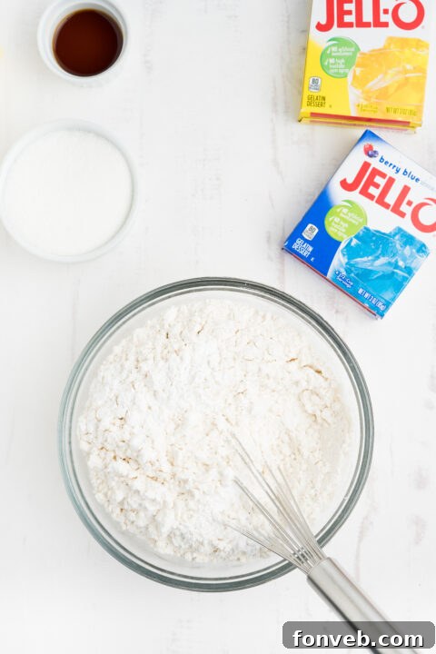 Vibrant Jello Bites 6 Step-by-step image of creaming butter and sugar for Jello Cookies.