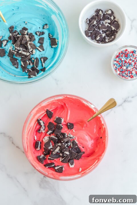 Mixing bowl with whipped topping, cream cheese, and powdered sugar for the cake filling.