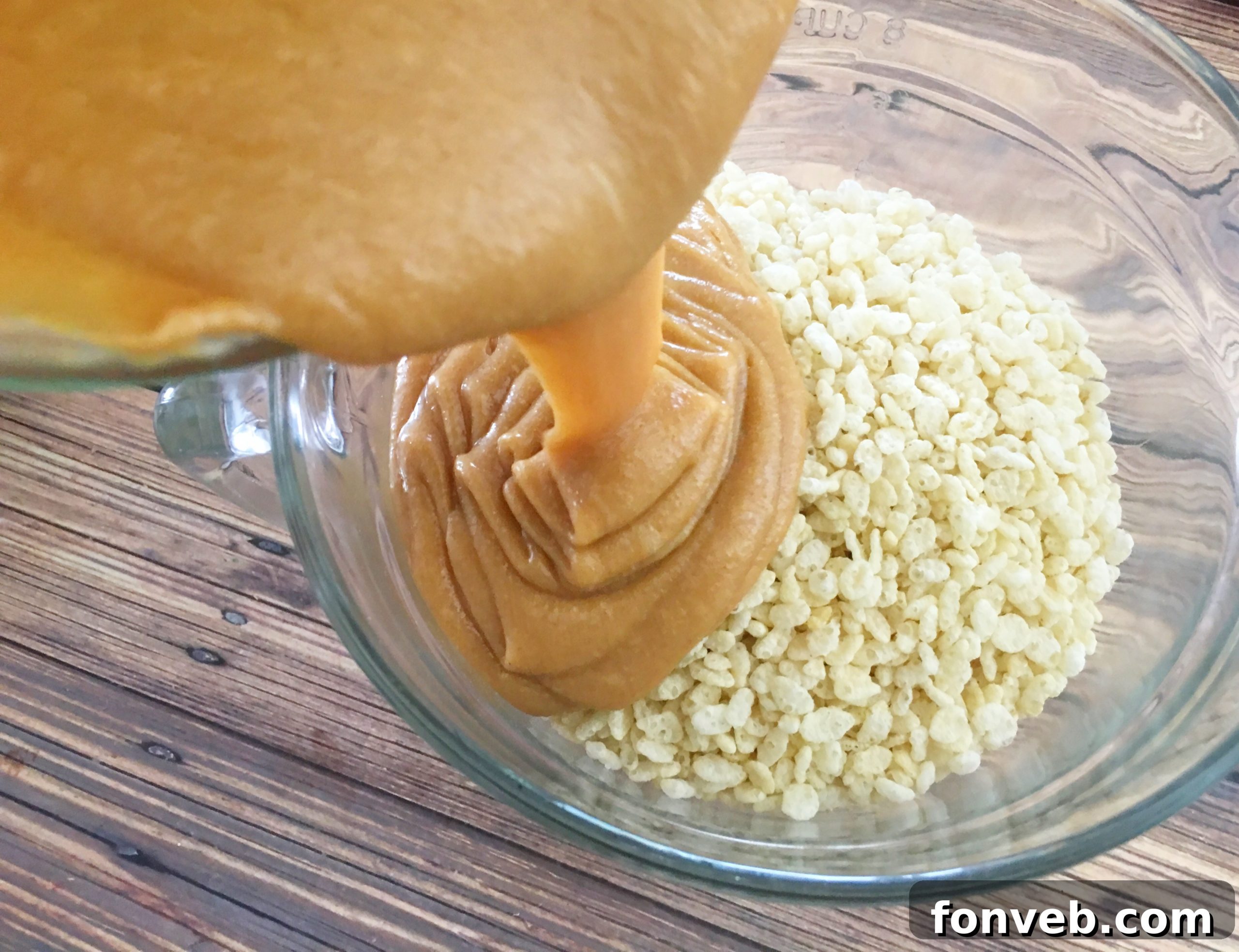 Hands preparing no-bake cookie mixture in a bowl