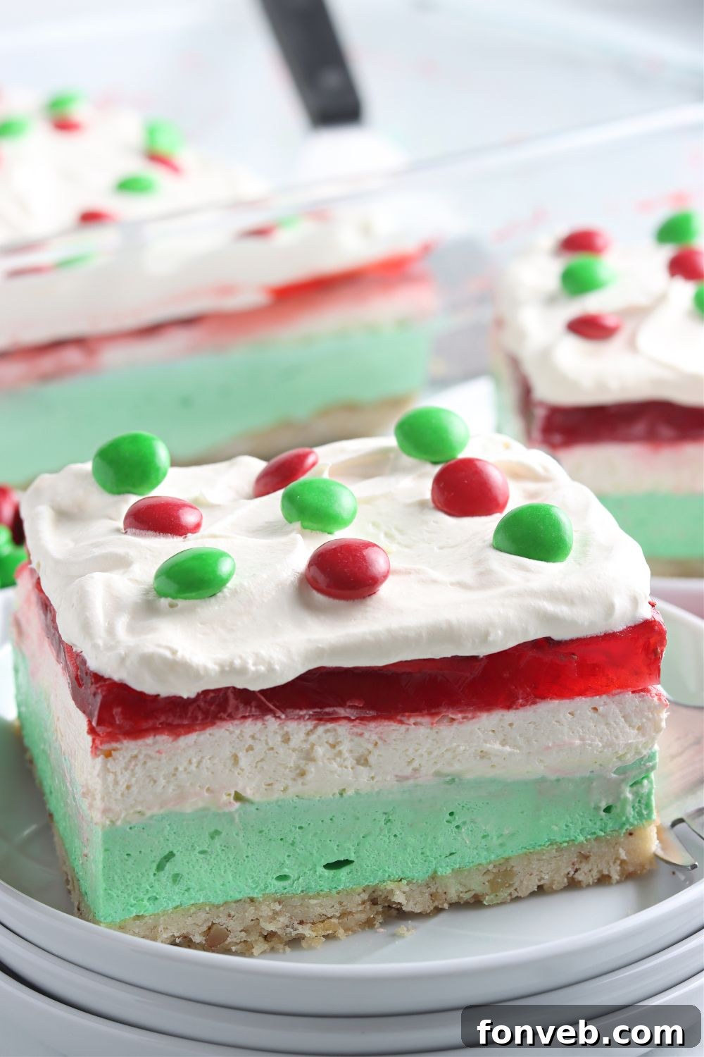 A beautifully plated slice of Christmas dessert lasagna.