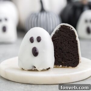 Sliced Halloween Oreo truffle on marble platter