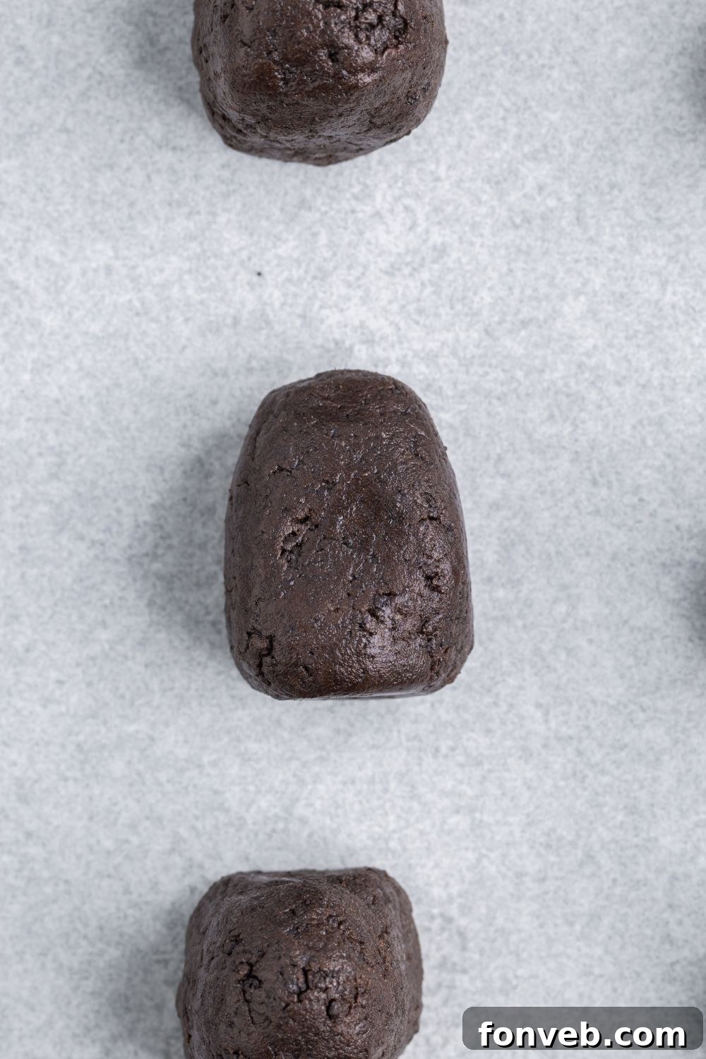 Oreo truffle mixture shaped into a bell