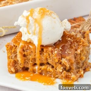 sliced earthquake cake on plate drizzled with caramel and a scoop of ice cream