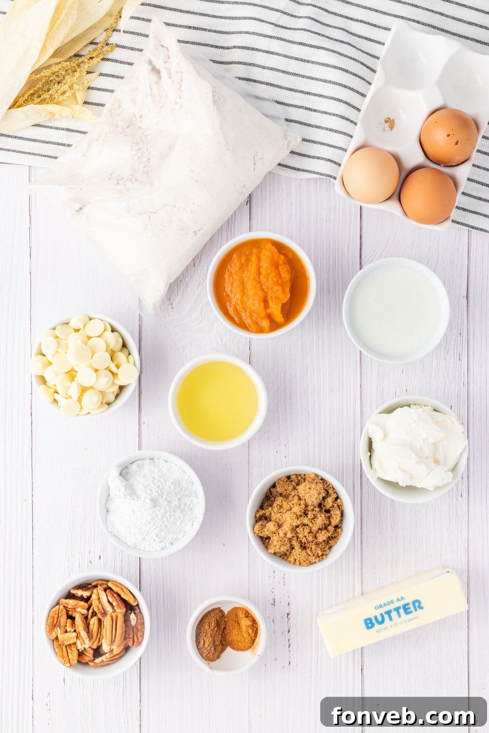 cake mix ingredients in small bowls on white counter