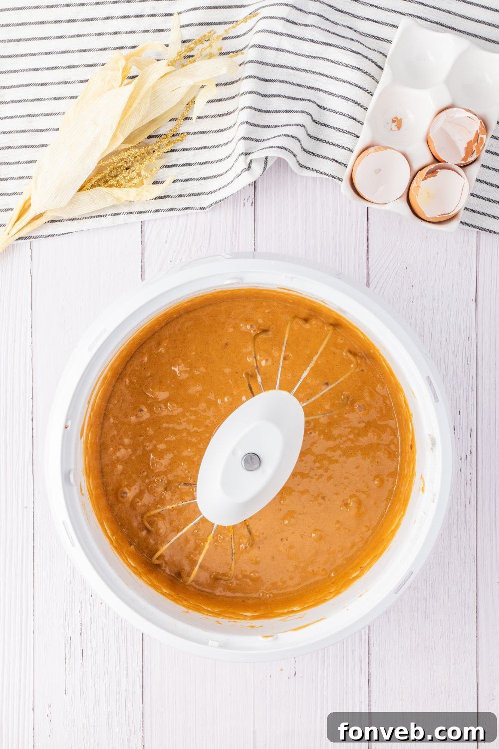 mixing up cake mix in a mixer