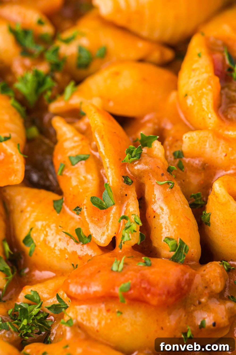 close up of cheesy pasta taco pasta in a pan 