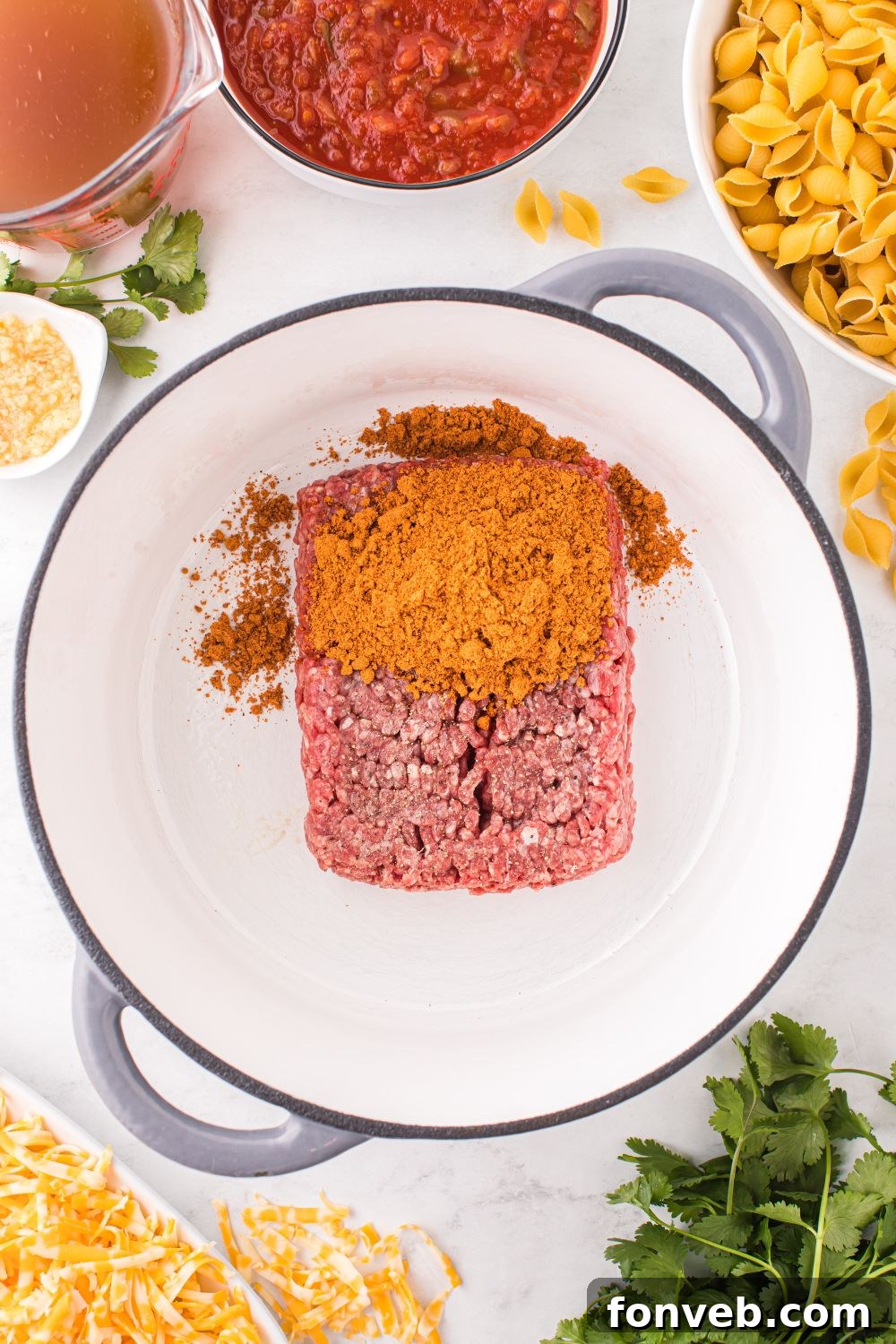 ground beef and taco seasoning in a pot 