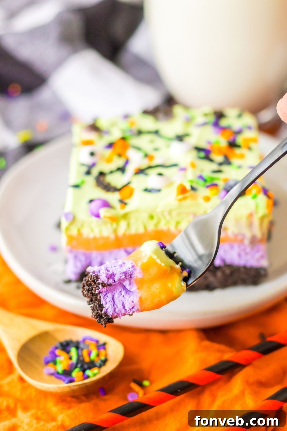 sliced cake on plate with fork bite